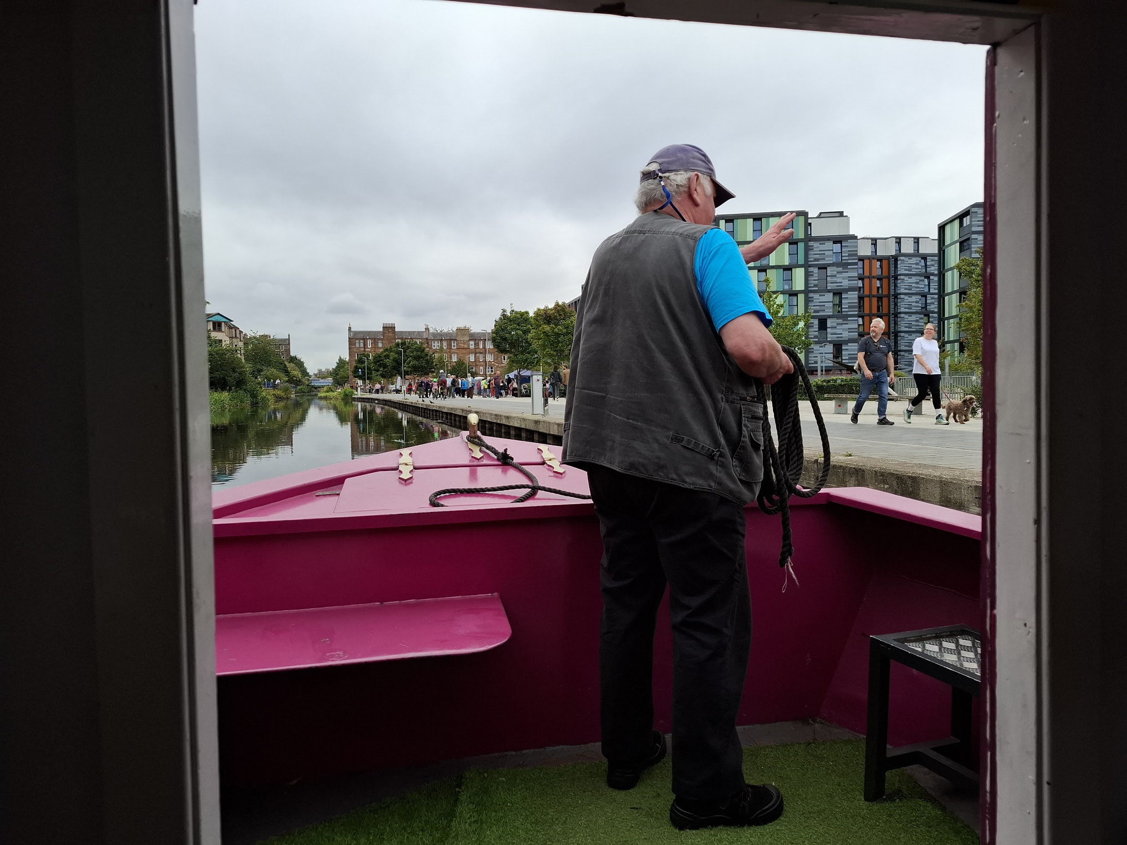 Richard preparing as the barge approaches the mooring as the journey ends